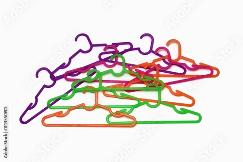 Colorful Plastic Clothes Hangers on White Background