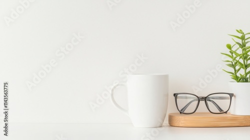 A minimalist setup featuring a white mug, eyeglasses, and a small plant on a wooden tray against a plain background.