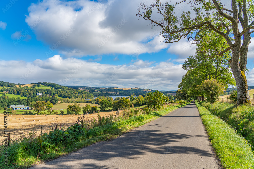 Landscape at Glamis in Scotland with a blue sky and some clouds in late summer Landscape at Glamis in Scotland with a blue sky and some clouds in late summer