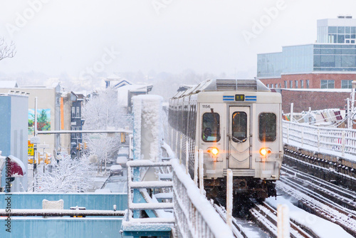 Train approaching 63rd Street station in Philadelphia just after a snowstorm in 2024