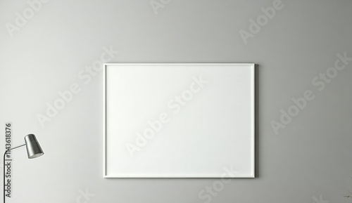 Empty Black Framed Picture on a Light Gray Wall. A high-quality, minimalist mockup of an empty black framed picture hanging on a light gray wall.