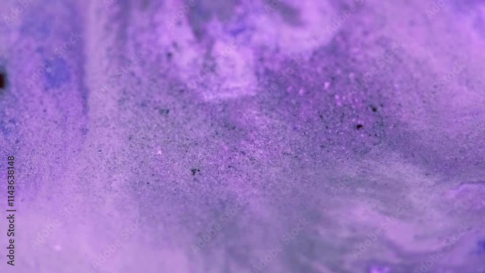 Glitter paint wave. Ink water spill. Defocused blue purple color sparkling fantasy fluid drip flow motion abstract art background.