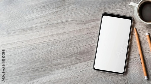 Minimalist workspace with mobile device and supplies. blank screen designs