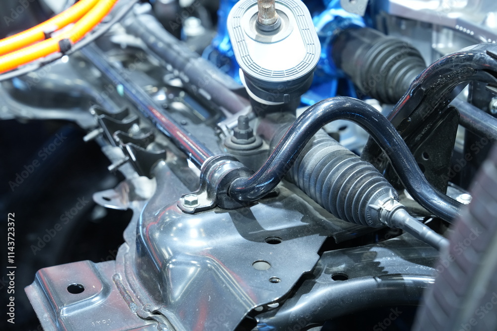 Fototapeta premium The drive shaft assembly in an electric train at a car show in Bangkok, Thailand, photographed on December 8, 2024.