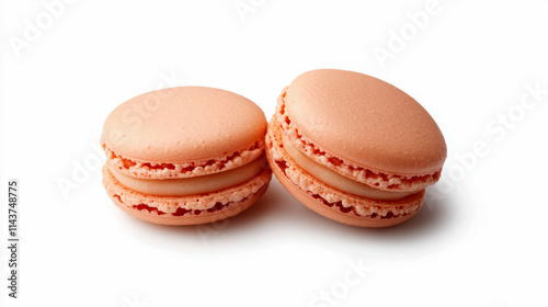 Delicious peach macarons on a white background for culinary visuals.