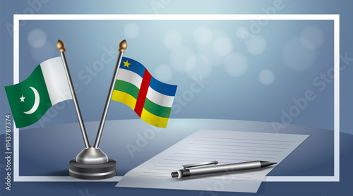 Pakistan and Central African Republic National flags on small table with bokeh background, cooperative relationship