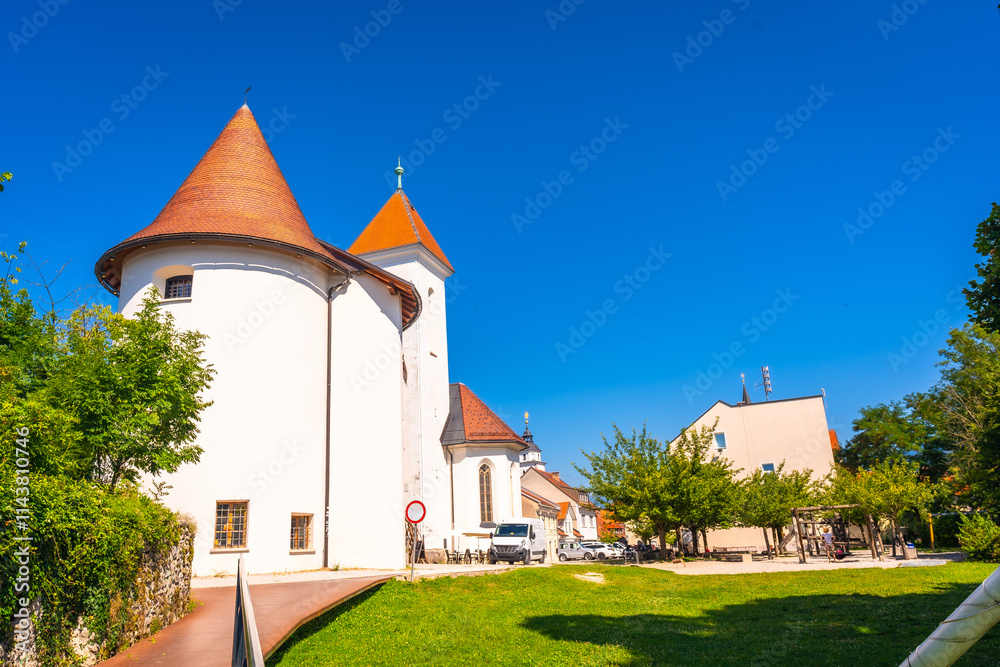 Plecnik's church of saint kancijan in kranj, slovenia, on a sunny summer day