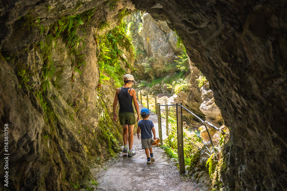 Mother and son exploring tolmin gorge in slovenia Mother and son exploring tolmin gorge in slovenia