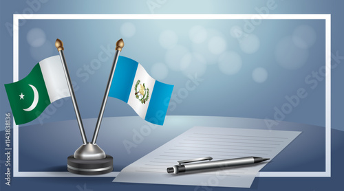 Pakistan and Guatemala National flags on small table with bokeh background, cooperative relationship