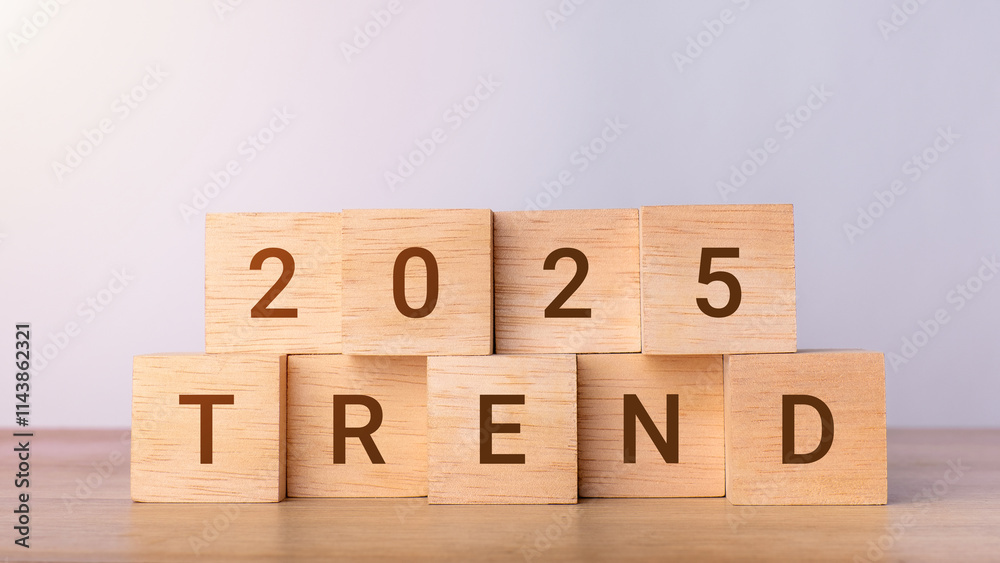 2025 Trends on wooden blocks. Marketing monitor, setup objective target business cost and budget planning and New Year holiday concepts 2025 Trends on wooden blocks. Marketing monitor, setup objective target business cost and budget planning and New Year holiday concepts