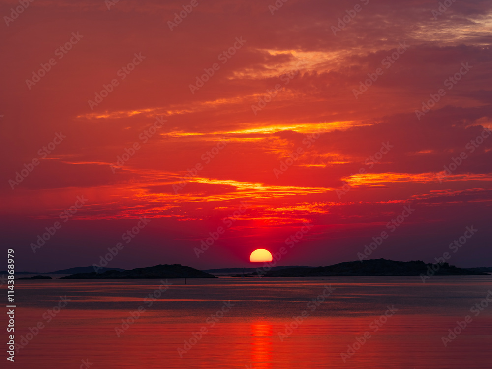 Scenic view of lake against orange sky during sunset Scenic view of lake against orange sky during sunset