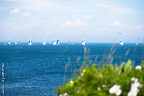 Boats sailing around Block Island in summer photo