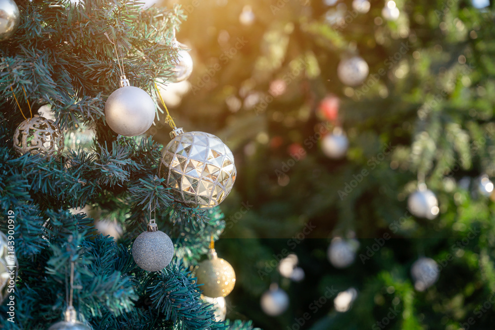 Merry x-mas,Close up of Colorful balls ,gifts box and Christmas greeting picture parcel,bell decoration on Green Christmas tree background Decoration During Christmas and New Year.