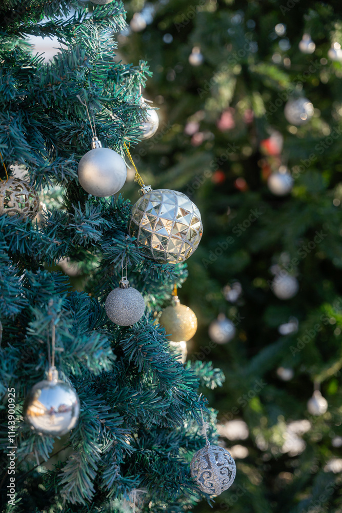 Merry x-mas,Close up of Colorful balls ,gifts box and Christmas greeting picture parcel,bell decoration on Green Christmas tree background Decoration During Christmas and New Year.