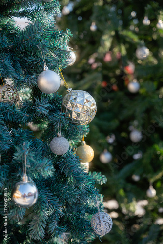 Obraz na płótnie Merry x-mas,Close up of Colorful balls ,gifts box and Christmas greeting picture parcel,bell decoration on Green Christmas tree background Decoration During Christmas and New Year. w salonie