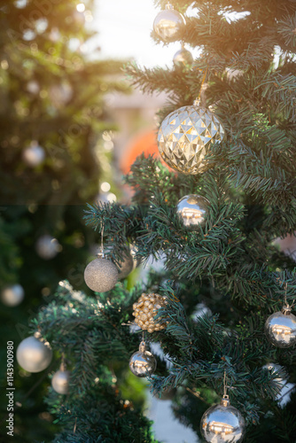 Obraz na płótnie Merry x-mas,Close up of Colorful balls ,gifts box and Christmas greeting picture parcel,bell decoration on Green Christmas tree background Decoration During Christmas and New Year. w salonie