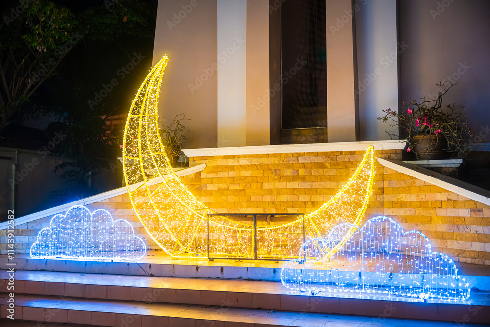 PHITSANULOK, THAILAND - December 15,2024:Decoration lights Christmas tree for celebrate Christmas and New Year Festival 2025 illumination at Saint Nicholas School in Phitsanulok City at night