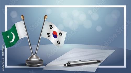 Pakistan and South Korea National flags on small table with bokeh background, cooperative relationship