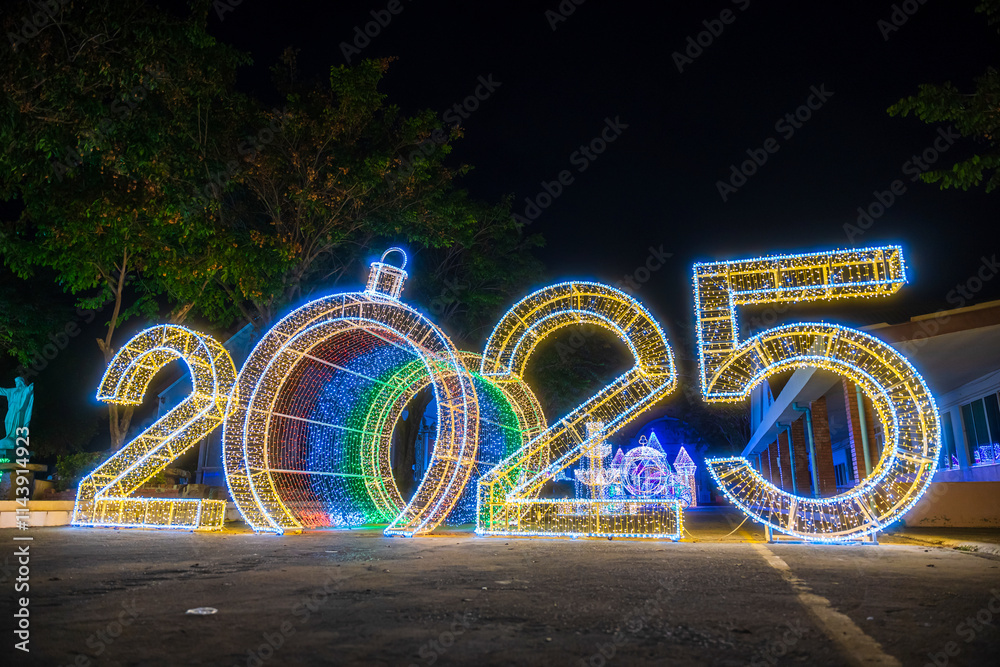 PHITSANULOK, THAILAND - December 15,2024:Decoration lights Christmas tree for celebrate Christmas and New Year Festival 2025 illumination at Saint Nicholas School in Phitsanulok City at night