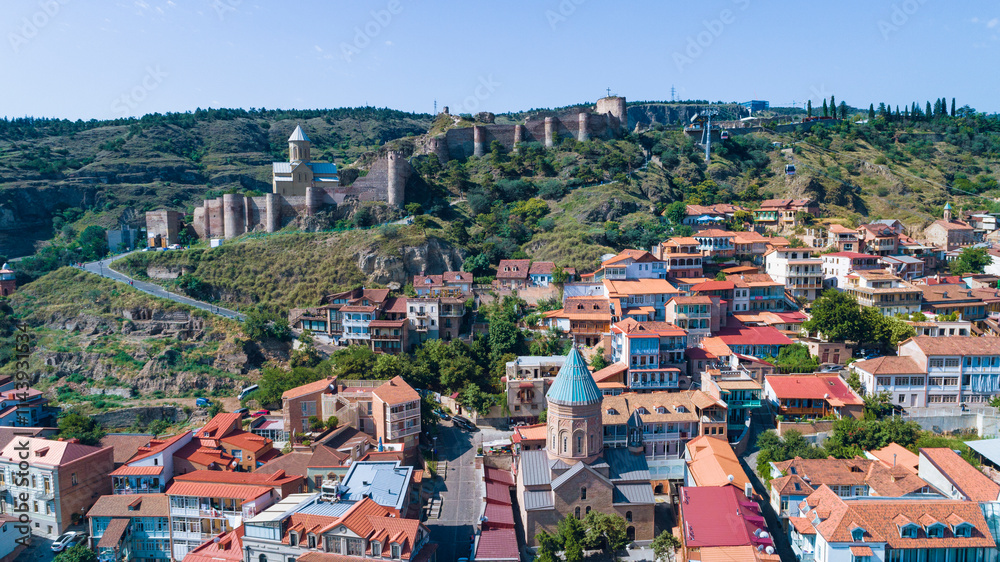 Aerial view of cityscape of Tbilisi Old Town and Narikala Fortress