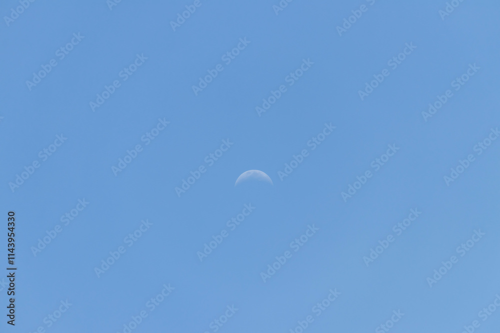 A serene sky with a crescent moon view A serene sky with a crescent moon view