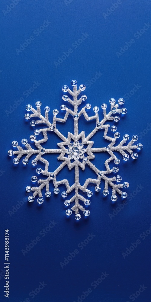 Simple Snowflake Background. Handcrafted Christmas Ornament on Elegant Blue Background Simple Snowflake Background. Handcrafted Christmas Ornament on Elegant Blue Background