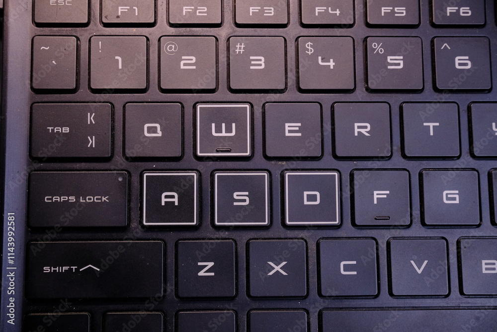 Closeup Black and White Laptop Keyboard With Modern Gaming Accent Closeup Black and White Laptop Keyboard With Modern Gaming Accent