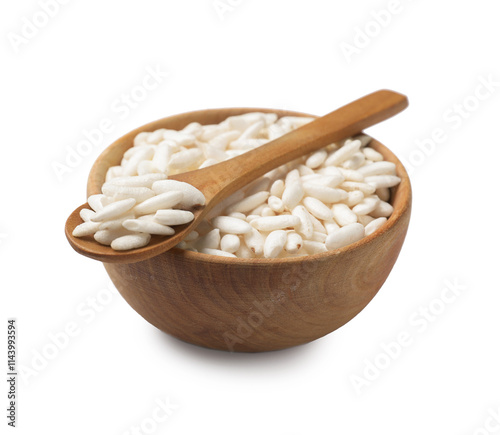 Puffed rice in bowl and spoon isolated on white photo