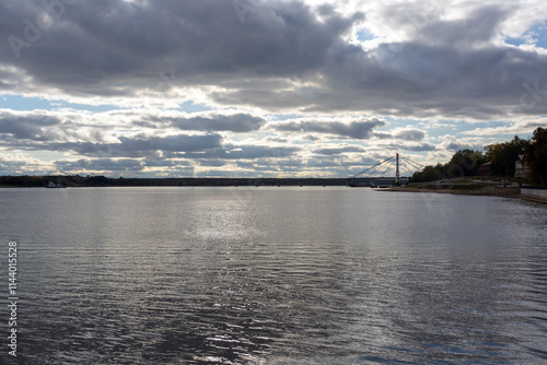 Cityscape, Sheksna river, Oktyabrsky bridge in the distance, Cherepovets, Vologda region, Russia