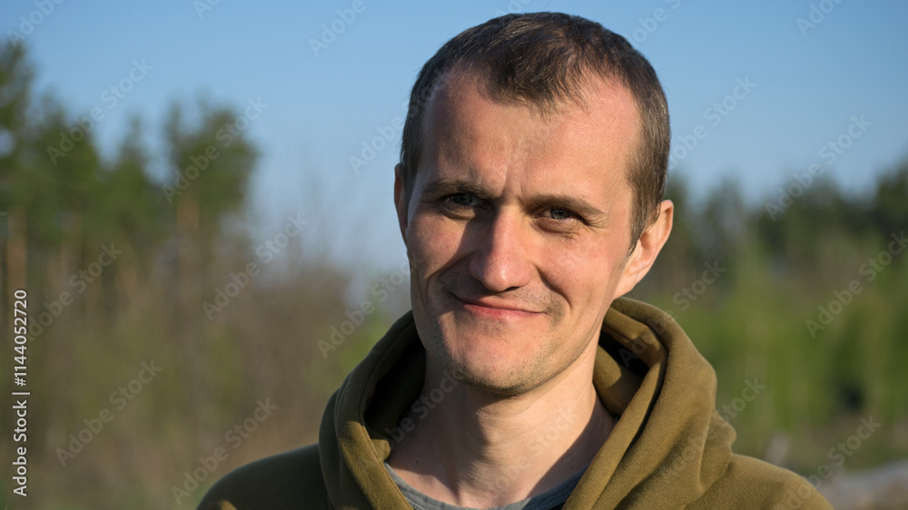 man portrait, European. the guy against the backdrop of nature. photo, smiling, thoughtful, surprised, indignant, feelings, emotions. fair skin, slight stubble. man 30-40 years old. close-up man portrait, European. the guy against the backdrop of nature. photo, smiling, thoughtful, surprised, indignant, feelings, emotions. fair skin, slight stubble. man 30-40 years old. close-up