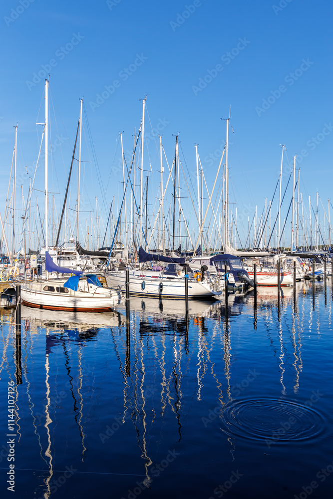 Marina with sailing boats yachts portrait format at the Baltic Sea in Heiligenhafen, Germany Marina with sailing boats yachts portrait format at the Baltic Sea in Heiligenhafen, Germany