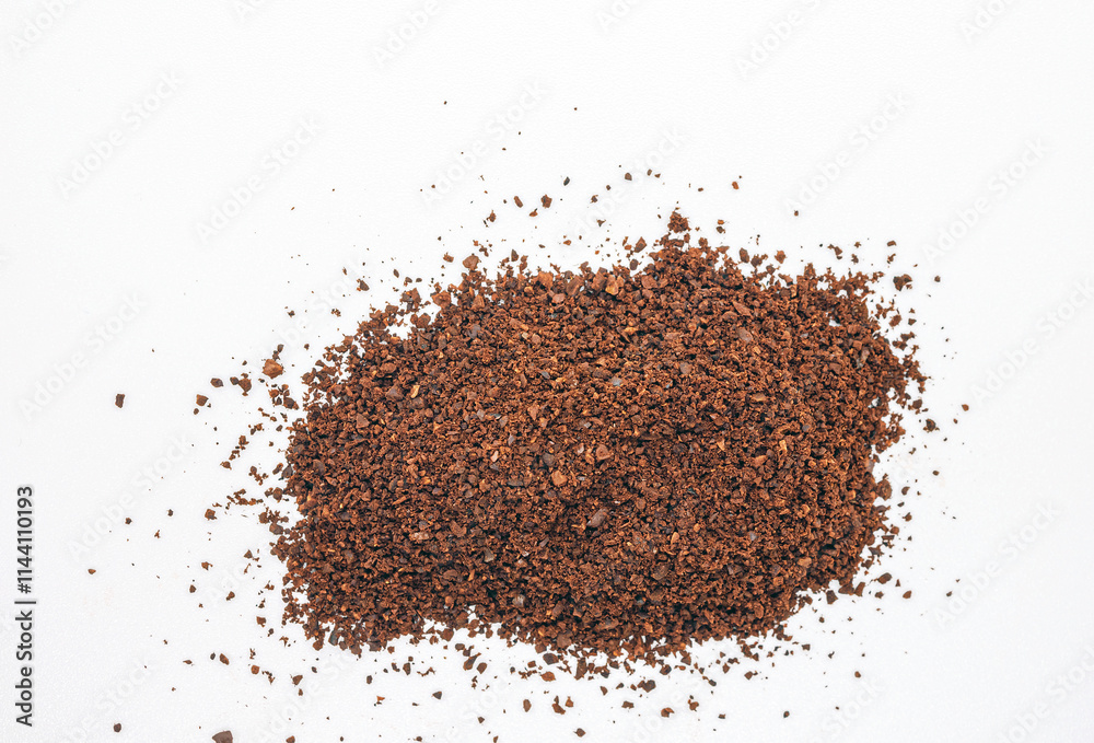 Ground coffee powder or fresh coffee grain isolated on white background, Top view Ground coffee powder or fresh coffee grain isolated on white background, Top view