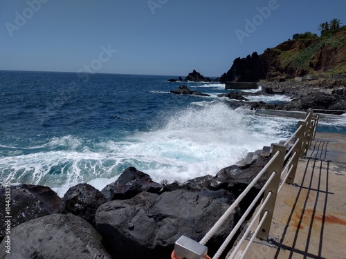 waves crashing on rocks