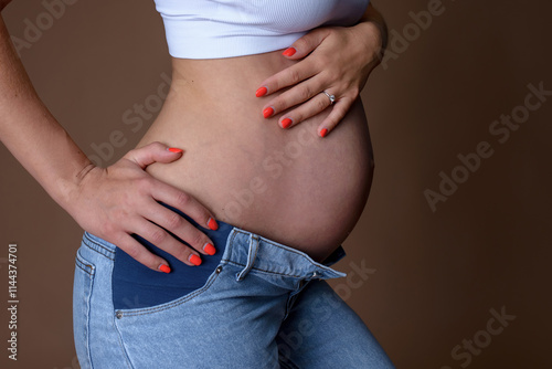 Pregnant woman at the clinic during a routine check-up photo