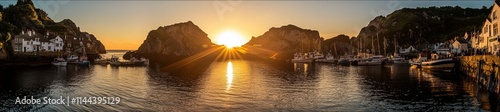 The harbour at Mevagissey in Cornwall, seen at sunrise. photo