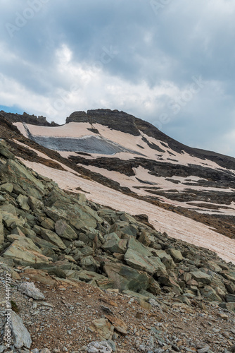 Really small rest of Glacier Ferrand glacier with Monte Nivle mountain peak above in Cottian Alps on french-italian borders photo