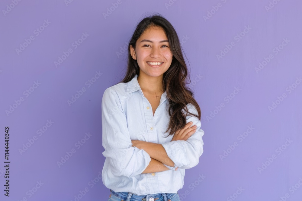 Happy young Latin woman in casual clothes smiling at camera. Happy young Latin woman in casual clothes smiling at camera.