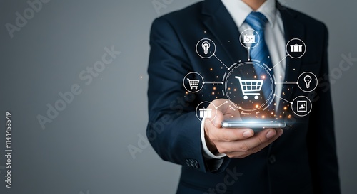 Businessman hold smartphone with online shopping concept, marketplace website with virtual interface of online Shopping cart part of the network, Online shopping business with selecting shopping cart photo