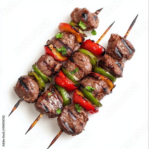 Grilled beef and vegetable skewers ready for serving at a summer barbecue gat...