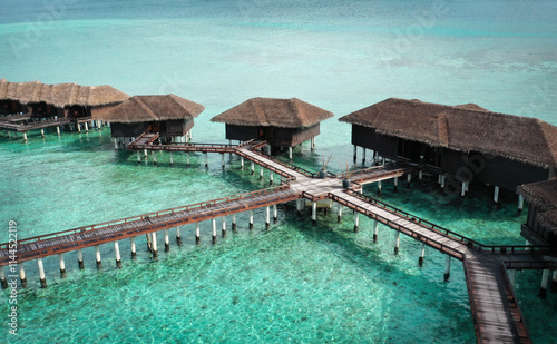 Obraz na płótnie Luxury Hotel Bungalows over the Ocean, Maldives w salonie
