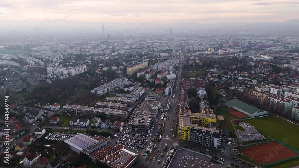 Austria, Vienna: Top Aerial View of Quiet Residential Areas in Districts 21 & 22. A peaceful perspective showcasing the serene neighborhoods of the Austrian capital Austria, Vienna: Top Aerial View of Quiet Residential Areas in Districts 21 & 22. A peaceful perspective showcasing the serene neighborhoods of the Austrian capital