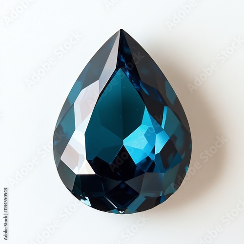 Stunning teal gemstone cut in a teardrop shape resting on a white background,...