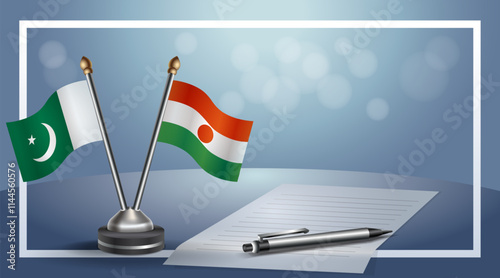 Pakistan and Niger National flags on small table with bokeh background, cooperative relationship