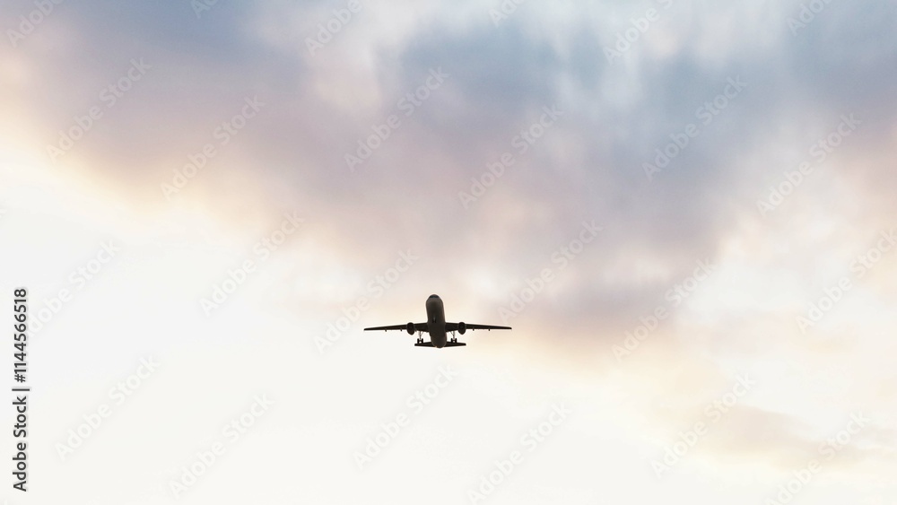 ULTRA HD. Airplane flies in blue sky. Travel. Airplane takes off against the background of sunset sky. ULTRA HD. Airplane flies in blue sky. Travel. Airplane takes off against the background of sunset sky.