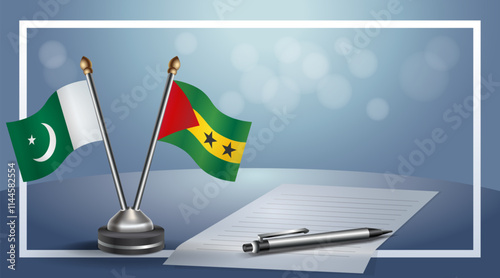 Pakistan and Sao Tome and Principe National flags on small table with bokeh background, cooperative relationship