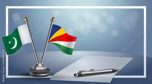 Pakistan and Seychelles National flags on small table with bokeh background, cooperative relationship