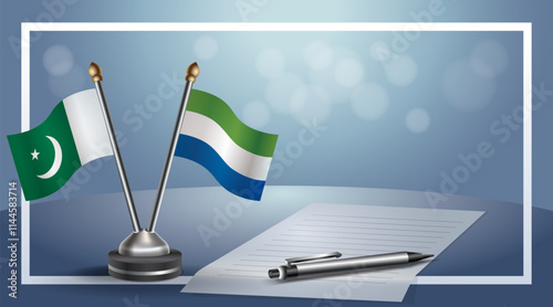 Pakistan and Sierra Leone National flags on small table with bokeh background, cooperative relationship