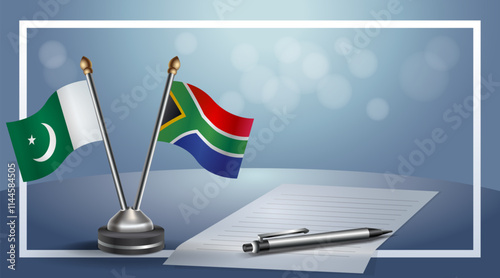 Pakistan and South Africa National flags on small table with bokeh background, cooperative relationship