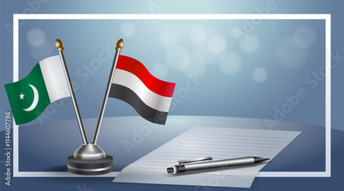 Pakistan and Yemen National flags on small table with bokeh background, cooperative relationship
