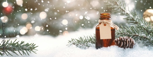 Christmas essential oil on winter background. Selective focus.